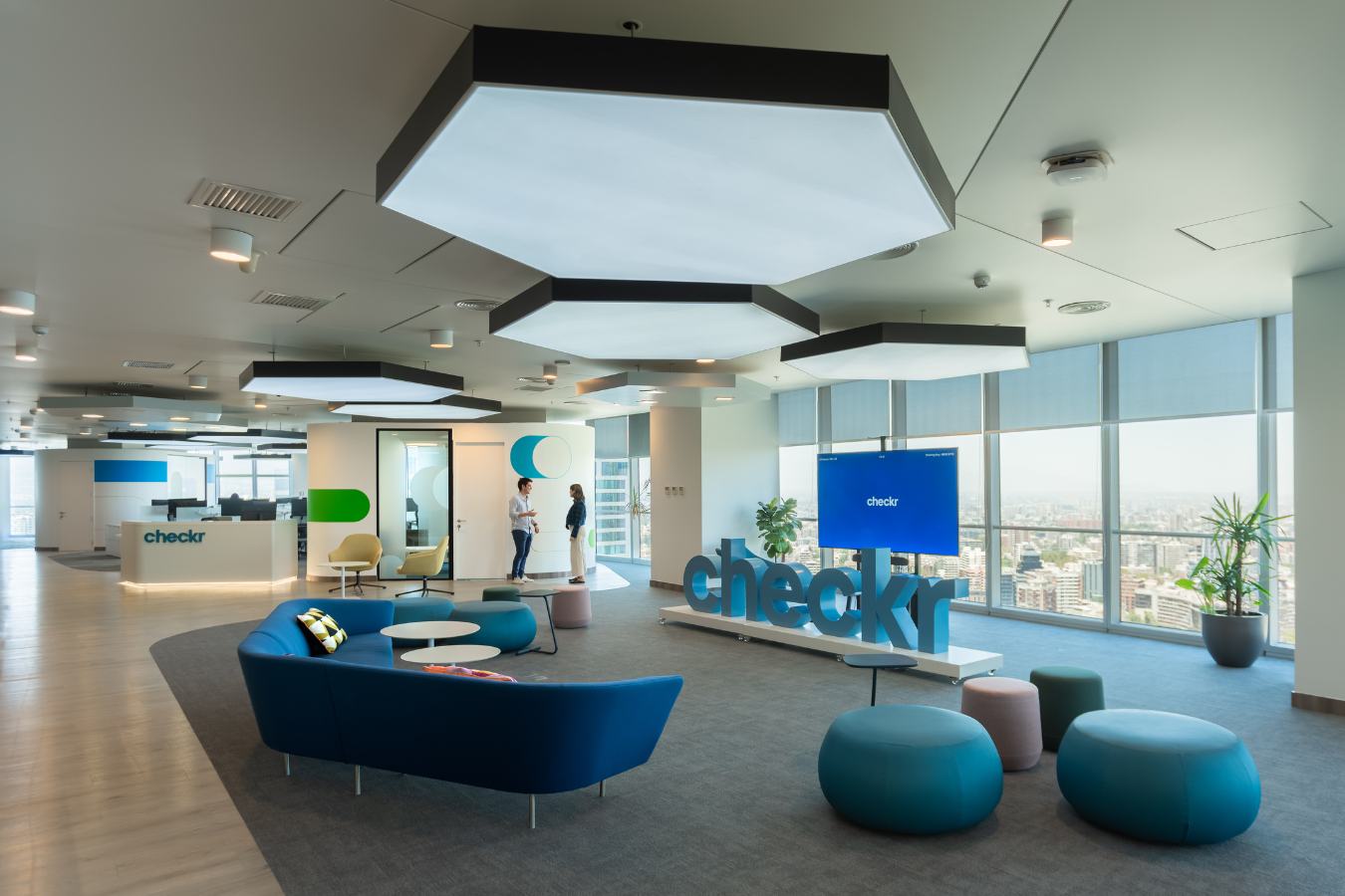 Checkr Offices - Wide view of the collaborative lounge area designed for informal meetings - Contract Workplaces.jpg